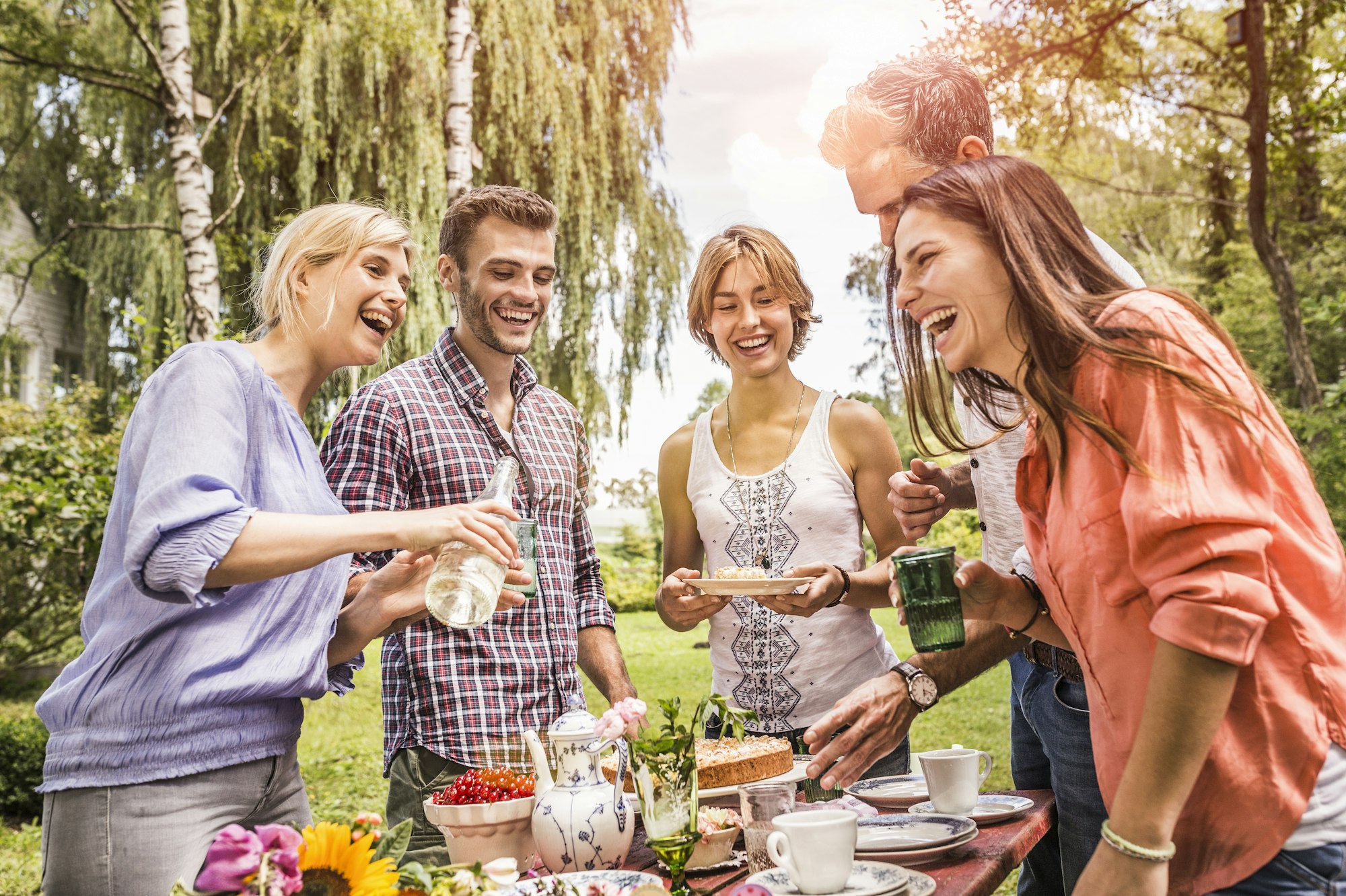 Group of friends enjoying garden party